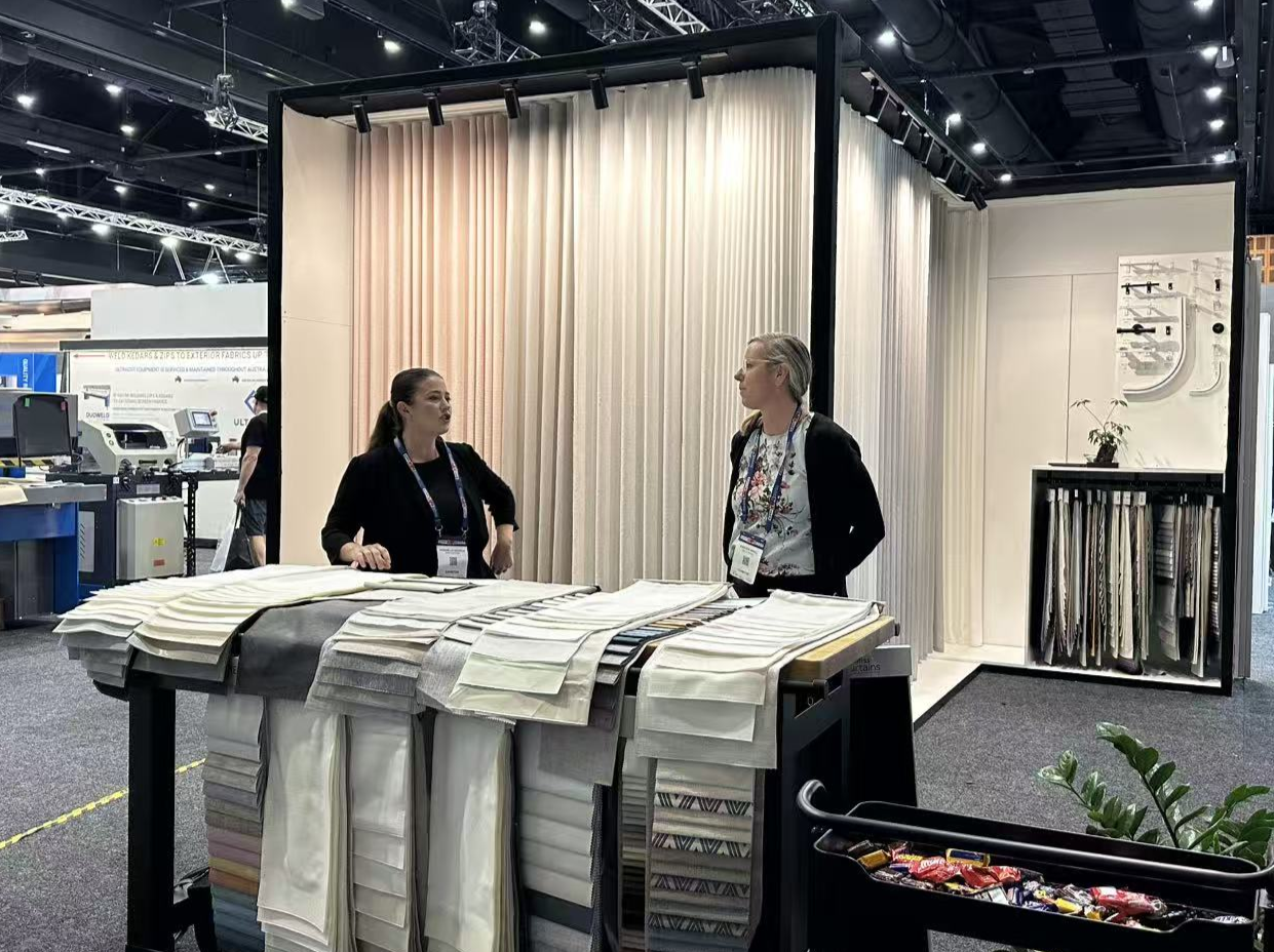 MC Curtain Supply team meeting trade visitors at Super Expo Gold Coast